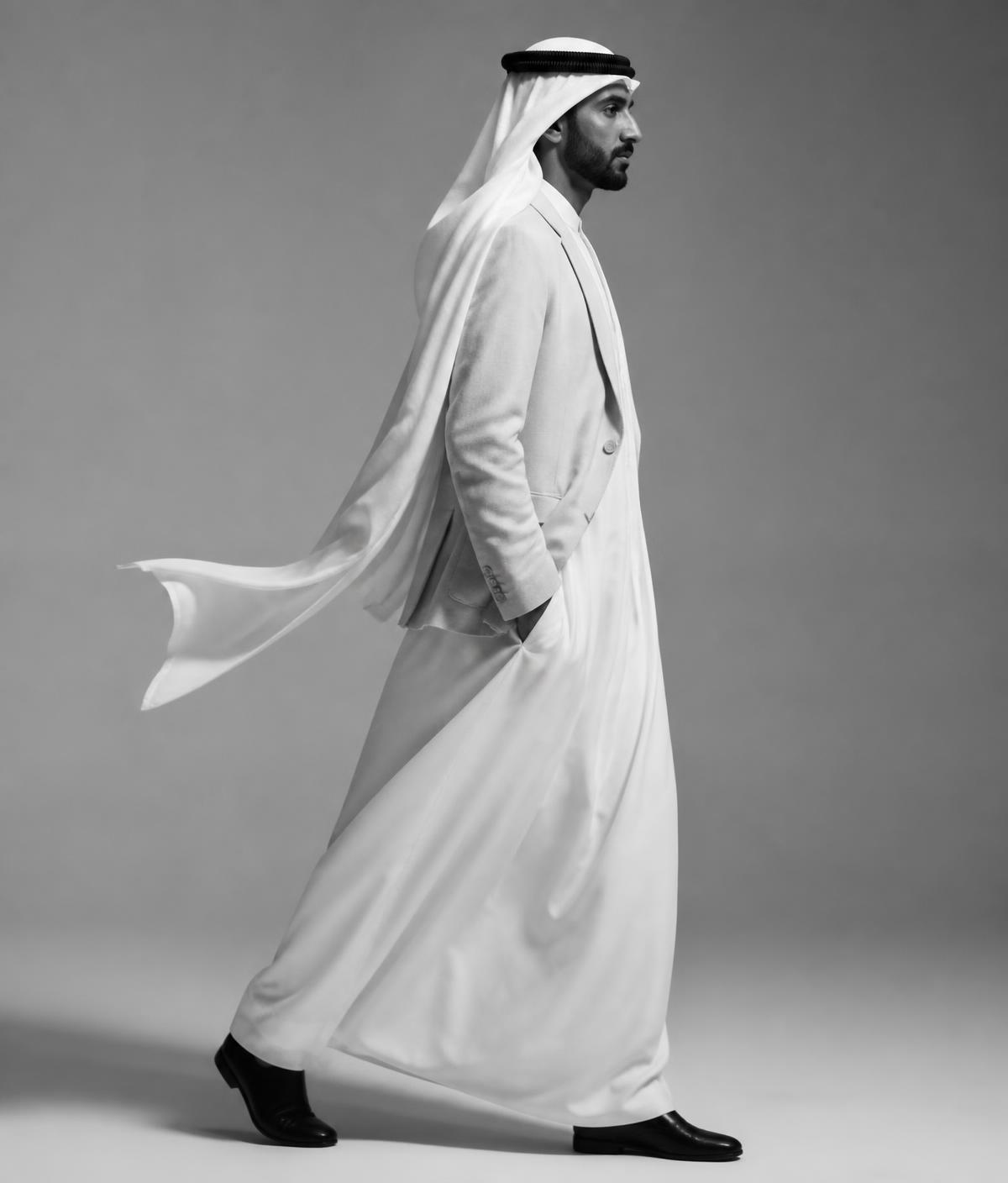 Model in a lightweight thobe and tailored jacket